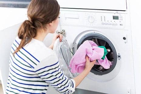 Why You Need to Wash New Clothes Before Wearing Them, According to a Dermatologist