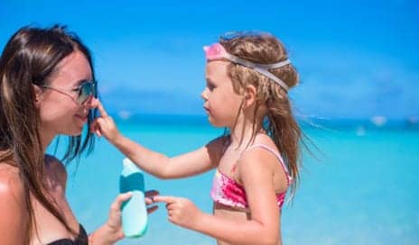 9 Most Commonly Missed Sunscreen Spots, According To Dermatologists