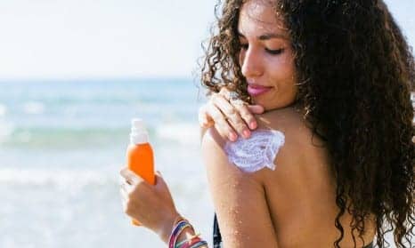 How To Properly Apply Sunscreen To Beat A Burn, According To Dermatologists