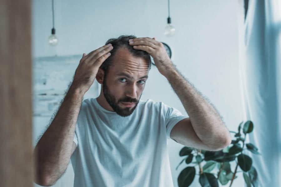The Truth About Online Hair-Loss Treatments Like Roman and Hims, According to a Dermatologist