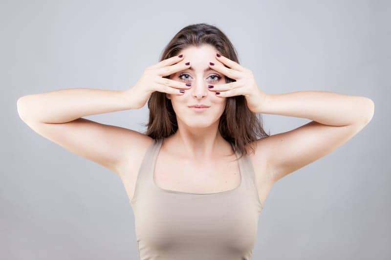 4 Facial Yoga Exercises to Firm Your Jaw, Minimize Fine Lines, and Banish Jowls